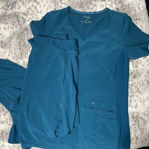 Cherokee iFlex Caribbean blue scrub top and joggers. Size M
